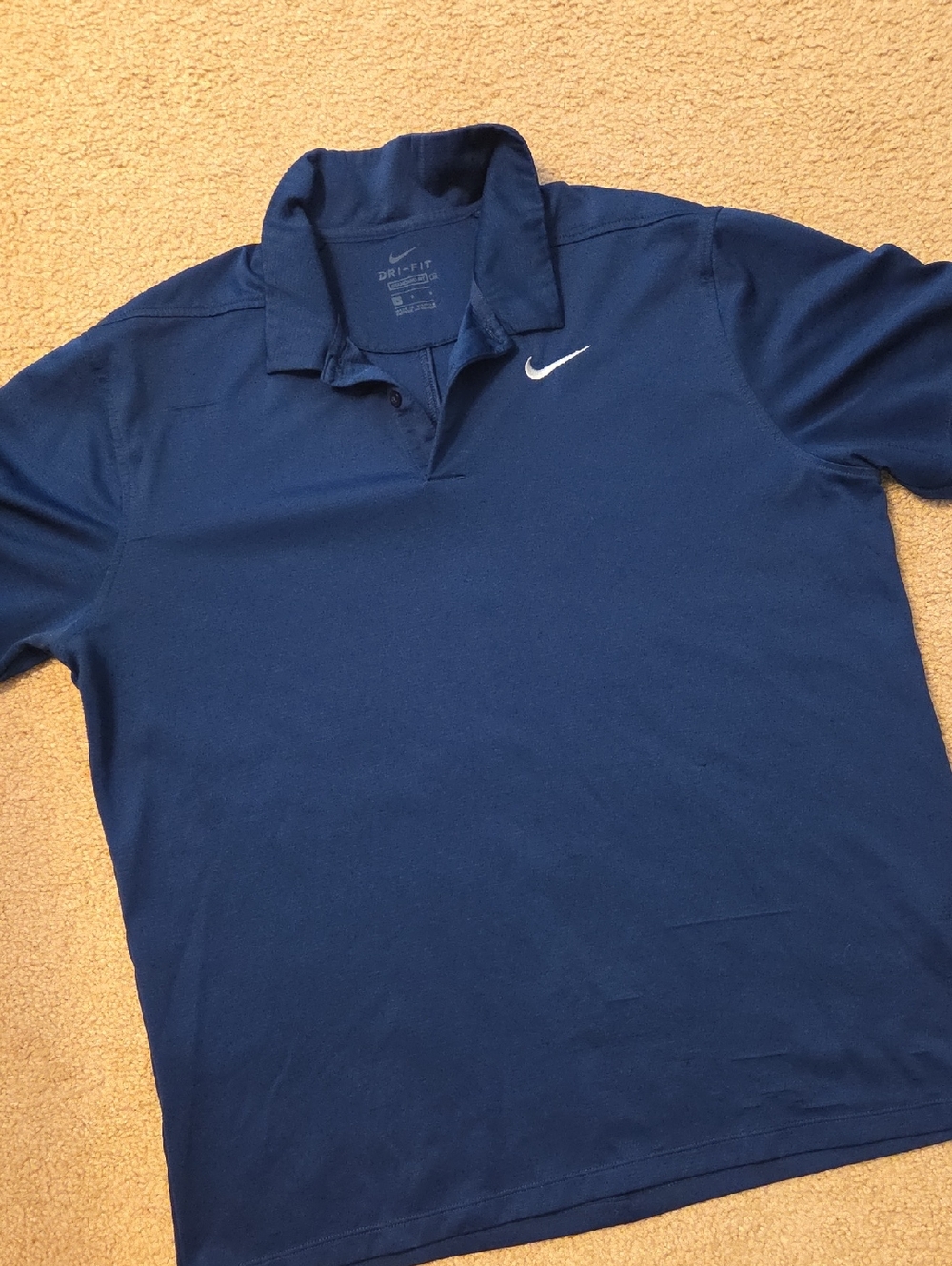 Nike Men’s Navy Blue Polo with White Swoosh